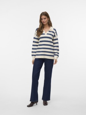 Vero Moda VMGOLD STRIPE LS LONG POLONECK PULL: Birch/W. DARK DENIM | Freewear VMGOLD STRIPE LS LONG POLONECK PULL: - www.freewear.nl - Freewear