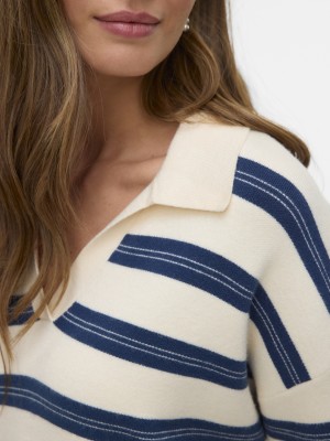 Vero Moda VMGOLD STRIPE LS LONG POLONECK PULL: Birch/W. DARK DENIM | Freewear VMGOLD STRIPE LS LONG POLONECK PULL: - www.freewear.nl - Freewear