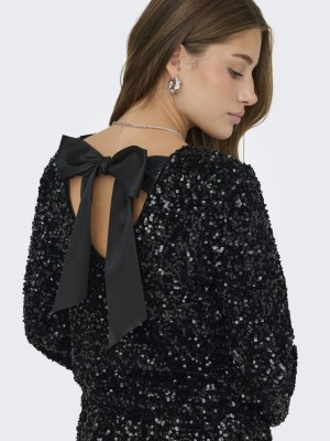 Only ONLCONFIDENCE L/S SEQUIN BOW TOP JR: Black/Black sequins+black bow | Freewear ONLCONFIDENCE L/S SEQUIN BOW TOP JR: - www.freewear.nl - Freewear